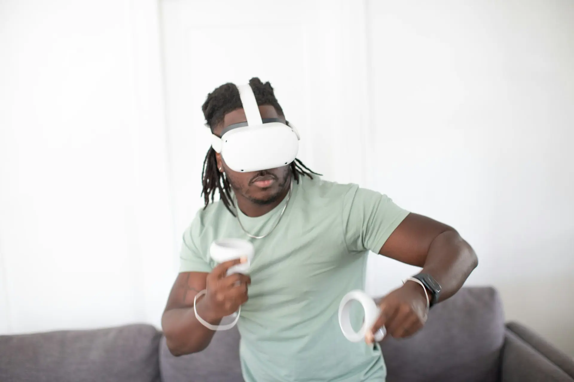 a person wearing a white mask and holding a white object